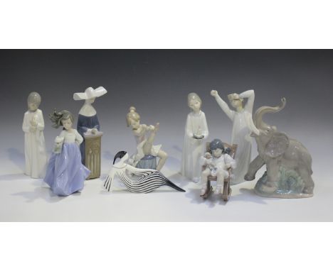 Five Lladro figures, including Tuesday's Child, No. 6014, and Meditation, No. 5502, together with three Nao figures, five Roy