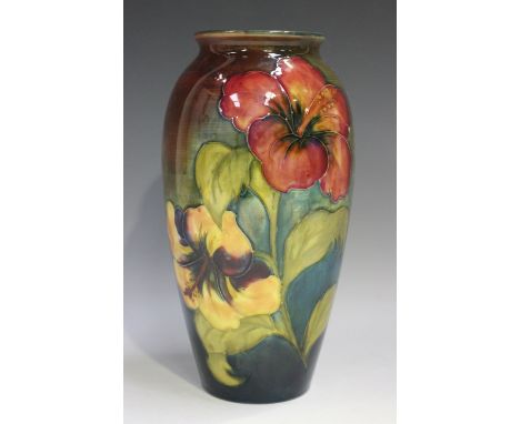 A Moorcroft flambé Hibiscus pattern vase, circa 1953-78, impressed mark, painted initials and printed paper Royal Warrant lab