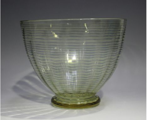 A Whitefriars amber tinted and threaded on sea green footed glass bowl, 1930s, designed by William Butler, pattern No. 7170, 