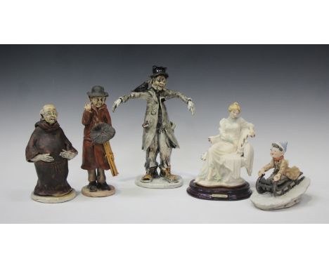 Two Capodimonte figures, comprising a seated elegant lady, designed by Giuseppe Armani, height 18.5cm, and a boy sledging, to