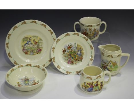 A small group of Royal Doulton Bunnykins tableware, comprising two graduated plates, two-handled mug, bowl, jug and mug, toge