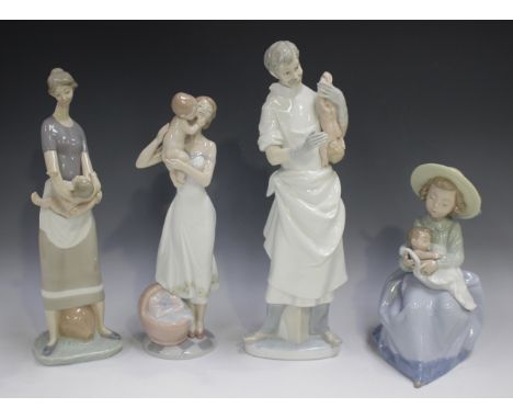 Two Lladro porcelain figures, comprising Mother and Child, No. 4575, and Obstetrician, No. 4763.3, a Lladro Utopia porcelain 