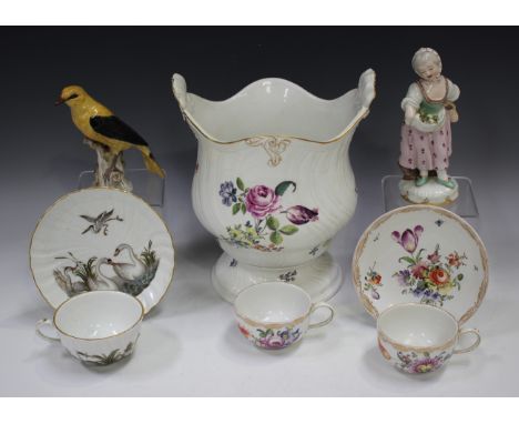 A Meissen porcelain planter or jardinière, 19th century, of wrythen moulded baluster shape on a circular foot, painted with o
