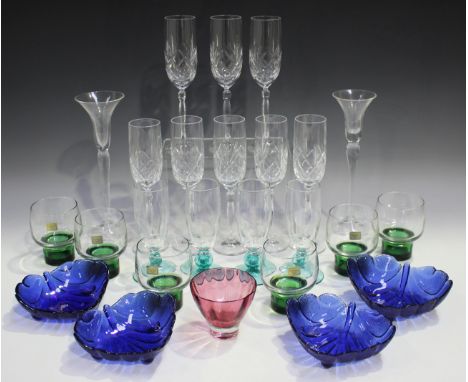 A group of decorative glassware, including a set of four wine glasses, each with a different coloured bowl, a set of eight ch