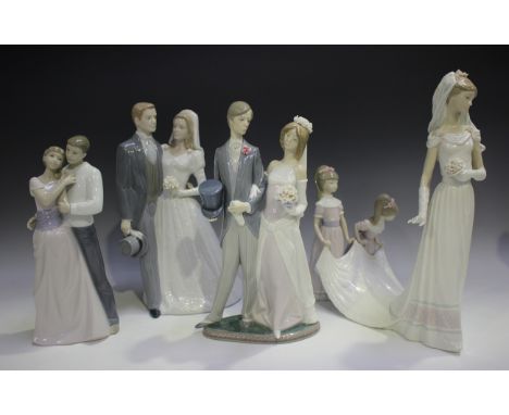 Two Lladro porcelain figures, comprising Here Comes the Bride, No. 1446, and Wedding, No. 1404 (minor faults and restoration)