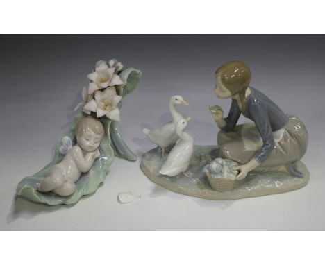 Two Lladro figures, comprising Dreaming on Dew Drops, No. 6787 (minor faults), and Food for Ducks, No. 4849.Buyer’s Premium 2
