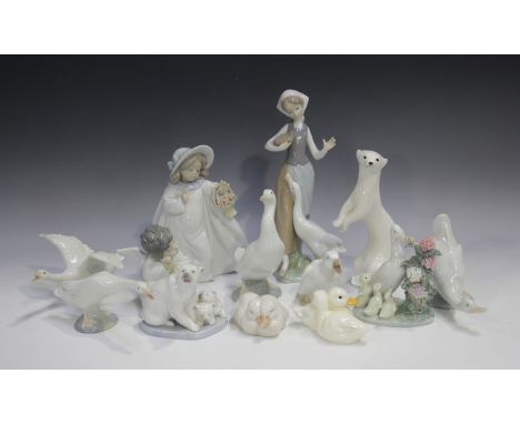 Seven Lladro figures, including How Do You Do?, No. 1439, Dreams, No. 6684, and Polar Bear with Cubs, No. 5434, one boxed, to