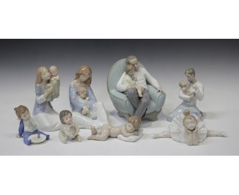 Eight Nao figures, including In Grandpa's Arms, No. 1346, two mother and child, a ballerina and three babies.Buyer’s Premium 