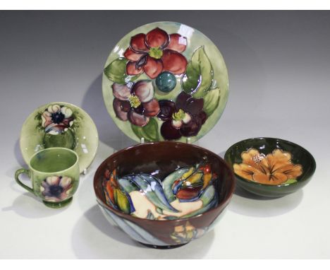 Five pieces of Moorcroft, comprising a Tulip bowl, diameter 16cm, a Hibiscus bowl, diameter 11.5cm, an Anemone coffee cup and