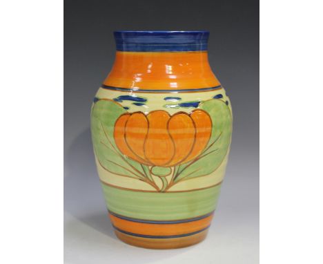 A Clarice Cliff Fantasque Orange Lily Isis vase, printed and impressed marks to base, height 24.5cm.Buyer’s Premium 29.4% (in