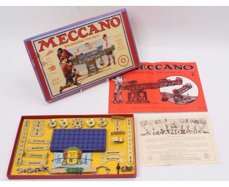 Meccano, 1936 Set 0 Outfit, gold, blue and yellow parts with various components, complete example with instruction manual and