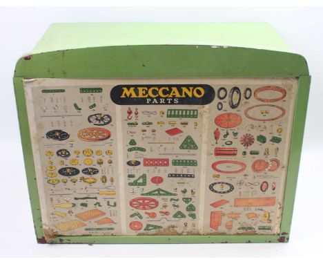 An original Meccano 1950s 6-drawer dealer's display cabinet with original cardboard Meccano parts display, containing a quant