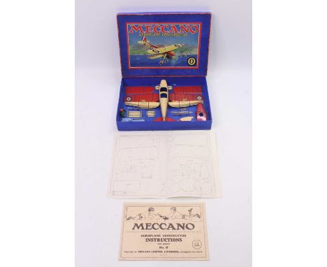 Meccano, No.0 Aeroplane Constructor Outfit, red and cream example, circa 1933, housed in the original card box, re-strung, wi