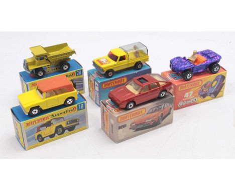 A tray containing five boxed Superfast Matchbox diecast vehicles to include a No. 8 Rover 3500, No. 18 Field Car with thin 4-
