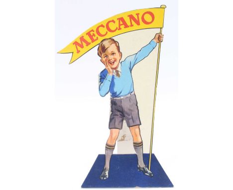 A Meccano shop display card titled The Meccano Boy, the card depicting a boy holding a Meccano flag, measuring 9½" high, and 