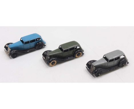 Collection of 3 Dinky Toy 30D Vauxhall DT Saloons, to include grey and black, blue and black, and a pre war mid-green with sm