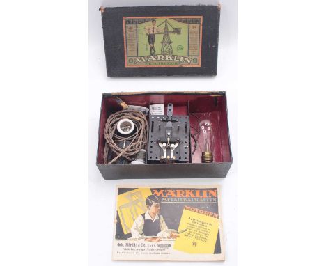 A Marklin No. 301 boxed electric motor, housed in the original labelled card box with instruction leaflet, electrical motor, 