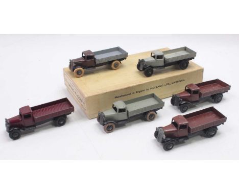 Dinky Toys 25e original trade box containing six tipping wagons: one with a grey cab, matching bed, and black tyres; one with