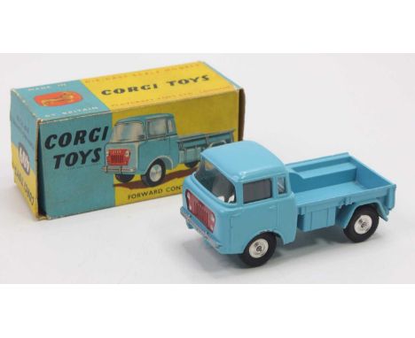 Corgi Toys No. 409 Forward Control Jeep, light blue body with red grille, flat spun hubs, in the original blue and yellow all