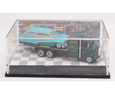 Hot Wheels No.18076 Approved Sample Pre Production Model of the Elwoody Custom Car on 38 Foe Truck, housed in a perspex displ