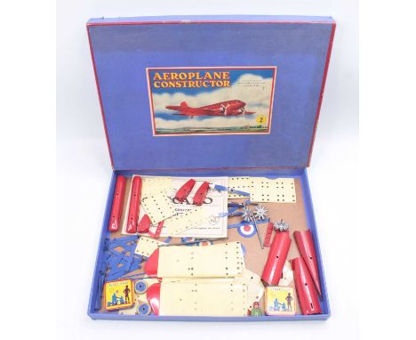 A Meccano No. 2 Aeroplane Constructor Outfit, unmade example, comprising of red &amp; cream and blue components, complete wit