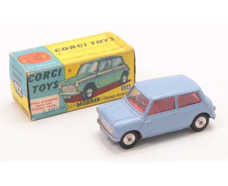 Corgi Toys No. 226 Morris Mini Minor comprising of blue body with red interior and spun hubs housed in the original blue &amp