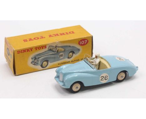 Dinky Toys, 107 Sunbeam Alpine Sports, pale blue body with cream interior and cream rigid hubs, white driver with windscreen,