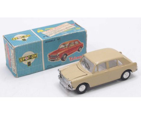 A Triang Spot-On Models No. 262 Morris 1100 with opening bonnet, comprising tan body with white interior and spun hubs, house