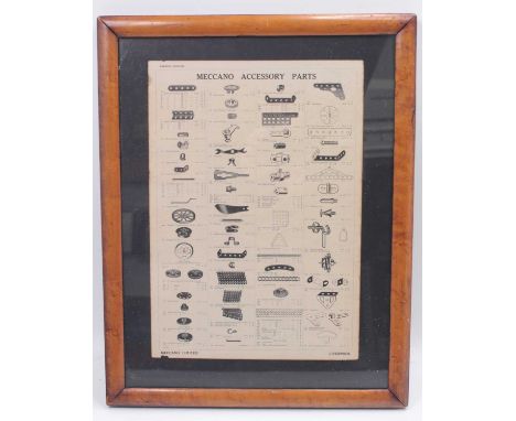 An original Meccano English edition accessory parts black &amp; white leaflet, framed and glazed in walnut frame, measures 37