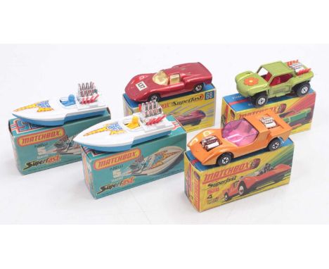 A tray containing five boxed Matchbox Superfast diecast vehicles to include No. 4 The Gruesome Twosome, No. 5 Sea Fire Boat w