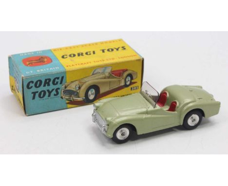 Corgi Toys No. 305 Triumph TR3 Sports Car, green body with red interior and silver hubs, housed in the original blue & yellow