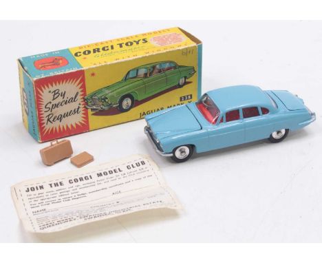 A Corgi Toys No. 238 Jaguar Mk X, comprising of light blue body with red interior, complete with spun hubs and luggage load, 