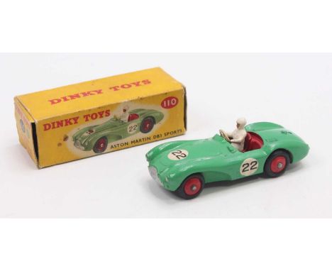Dinky Toys No. 110 Aston Martin DB3 sports car comprising a green body, red hubs and red interior with driver figure and raci