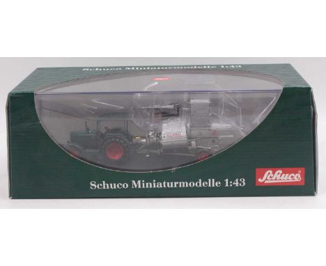 Schuco 1/43 scale cased Farming Tractor model of a Hanomag R40 Mit with Class Super Automatic Harvester, all housed in a plas