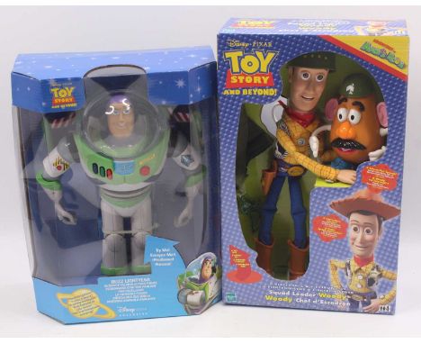Hasbro/Disney Store group of 2 battery-operated figure sets to include; Ultimate Talking Action Figure of Buzz Lightyear toge