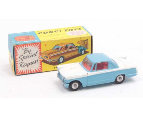 Corgi Toys, 231 Triumph Herald Coupe, blue and white body with red interior, shaped spun hubs, in the original blue and yello