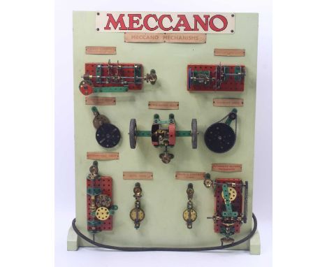 Meccano display model Mechanism Board. 1950's version mounted on a light green painted board measuring 46cm x 61cm. This disp