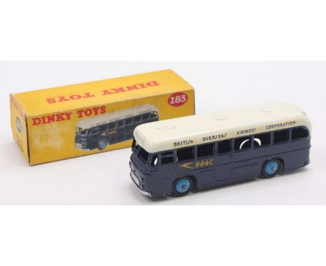 Dinky Toys No. 283 BOAC coach comprising dark blue &amp; white body with light blue hubs, in the original all-card box (VG-BV