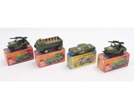 A collection of four boxed Matchbox Superfast diecast vehicles to include No. 54 Personnel Carrier comprising drab green body