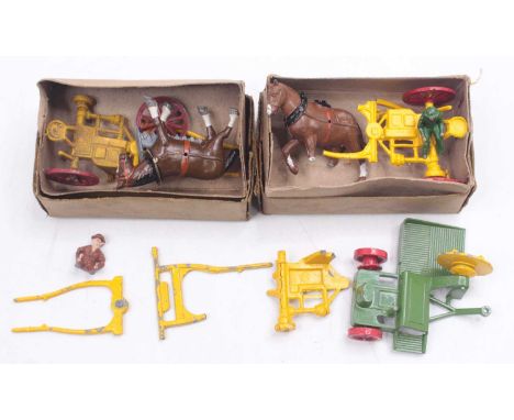 Two Charbens model grass cutters, comprising a horse, a yellow-bodied cutter, with red wheels, boxed, has suffered mazak rot,