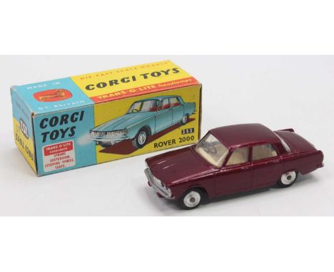 Corgi Toys, 252 Rover 2000, metallic maroon possible repainted body and touch ups with cream interior, silver trim, chrome sp