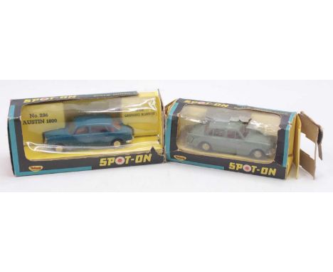 A Spot-On Models part boxes diecast group to include No. 286 Austin 1800, together with a Hillman Minx, both housed in heavil