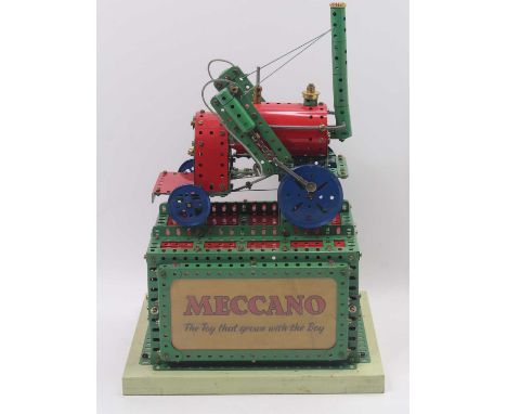 Meccano Shop Display Model early 1960's of the Rocket Locomotive built using Meccano in red, blue and green. Mounted on a woo