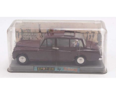 A Triang Spot-On Models No. 260 Royal Rolls Royce, comprising of plum coloured body with green interior with driver and atten