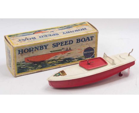 A Meccano Hornby tinplate speed boat titled Coronation, comprising red &amp; white body with single fixed key mechanism, and 