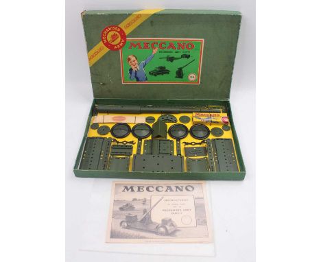 A Meccano mechanised Army No. MA Military Outfit, re-strung example on original backing card complete with original leaflet