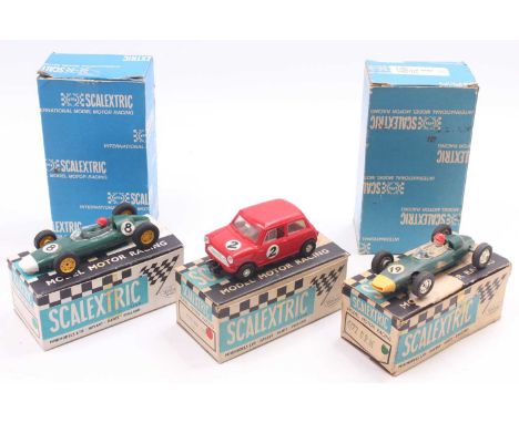 Collection of Scalextric Cars and Hand Throttles, to include C85 BRM, C72 BRM, C76 Mini Cooper and 2 boxed C265 Hand Throttle