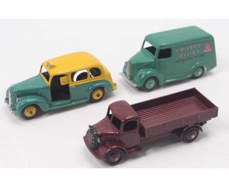 Dinky toys group of 3 to include; No.254 Austin Taxi in green lower and yellow upper body with yellow hubs, No.31C Chivers Je