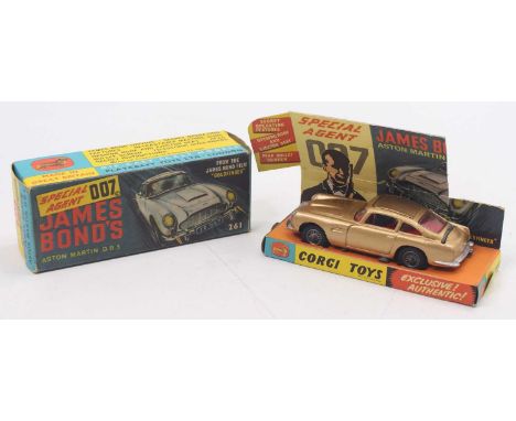 Corgi Toys No. 261 James Bond's Aston Martin DB5, metallic gold body, with wire wheels, all mechanisms in working order, come