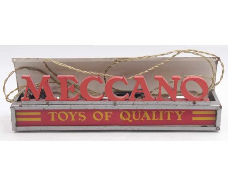 An original Meccano shop display electric sign fitted with three original bulbs, the metal unit to measure 16" x 3" x 5½", th